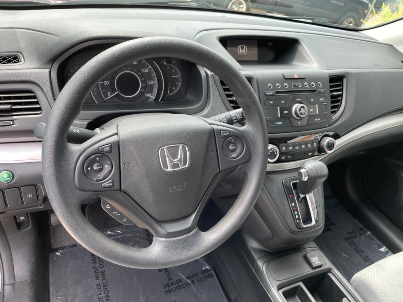 2016 Gray /Gray Honda CR-V SE 2WD (2HKRM3H4XGH) with an 2.4L L4 DOHC 16V engine, CVT transmission, located at 204 Hwy. 16 East, Carthage, MS, 39051, (601) 267-7277, 0.000000, 0.000000 - Photo #4