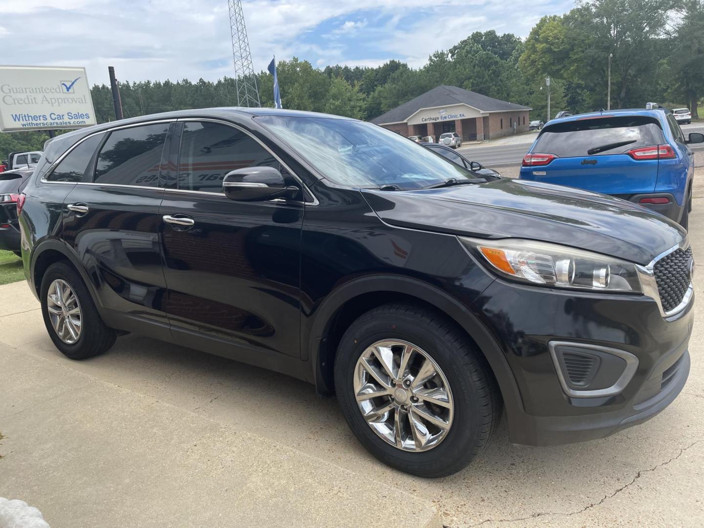 2016 Black /Black Kia Sorento LX 2WD (5XYPG4A31GG) with an 2.4L L4 DOHC 16V engine, 6-Speed Automatic transmission, located at 204 Hwy. 16 East, Carthage, MS, 39051, (601) 267-7277, 0.000000, 0.000000 - Photo#1