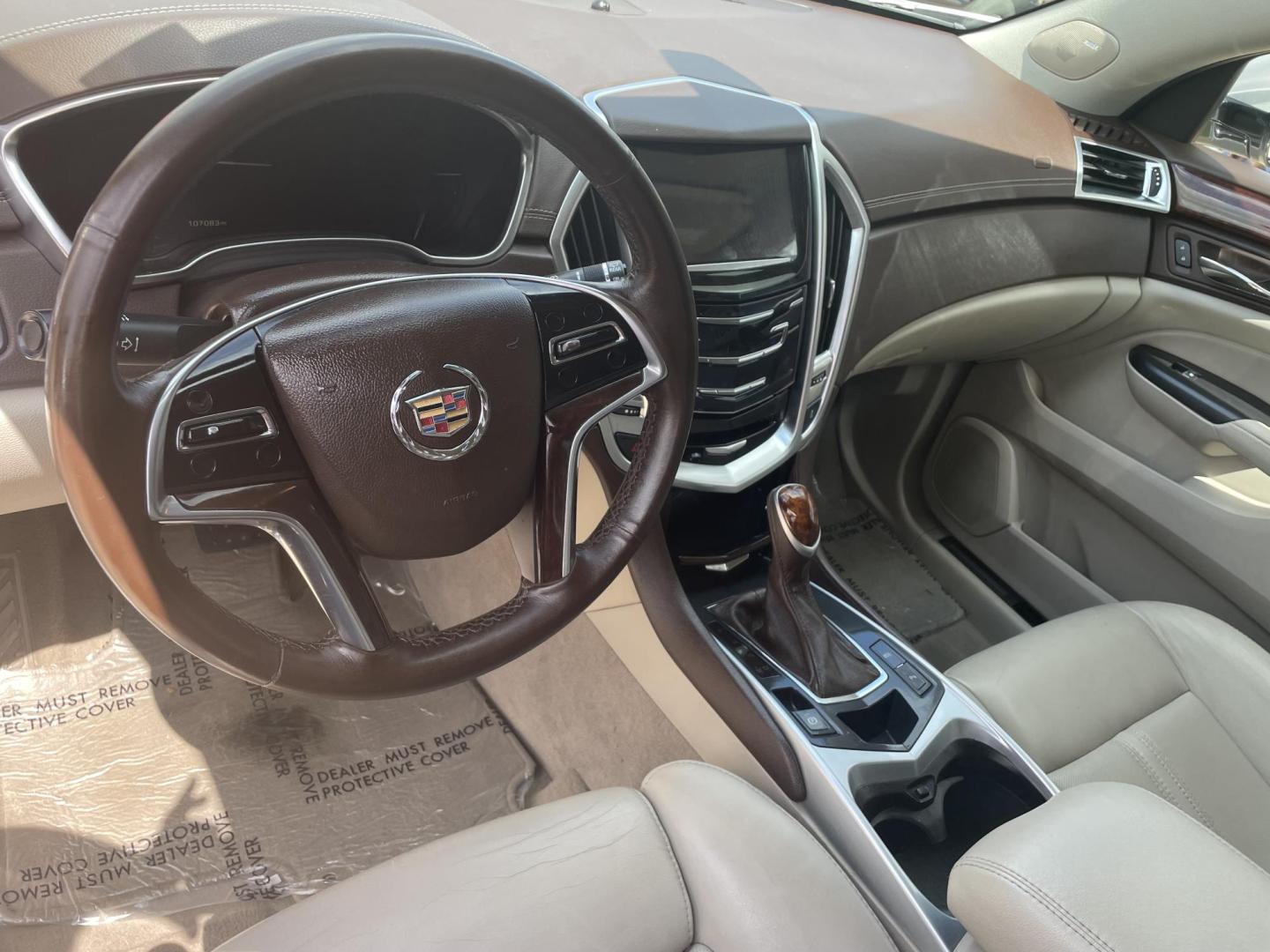 2016 White /Beige Cadillac SRX Luxury Collection FWD (3GYFNBE38GS) with an 3.6L V6 DOHC 24V FFV engine, 6A transmission, located at 204 Hwy. 16 East, Carthage, MS, 39051, (601) 267-7277, 0.000000, 0.000000 - Photo#5