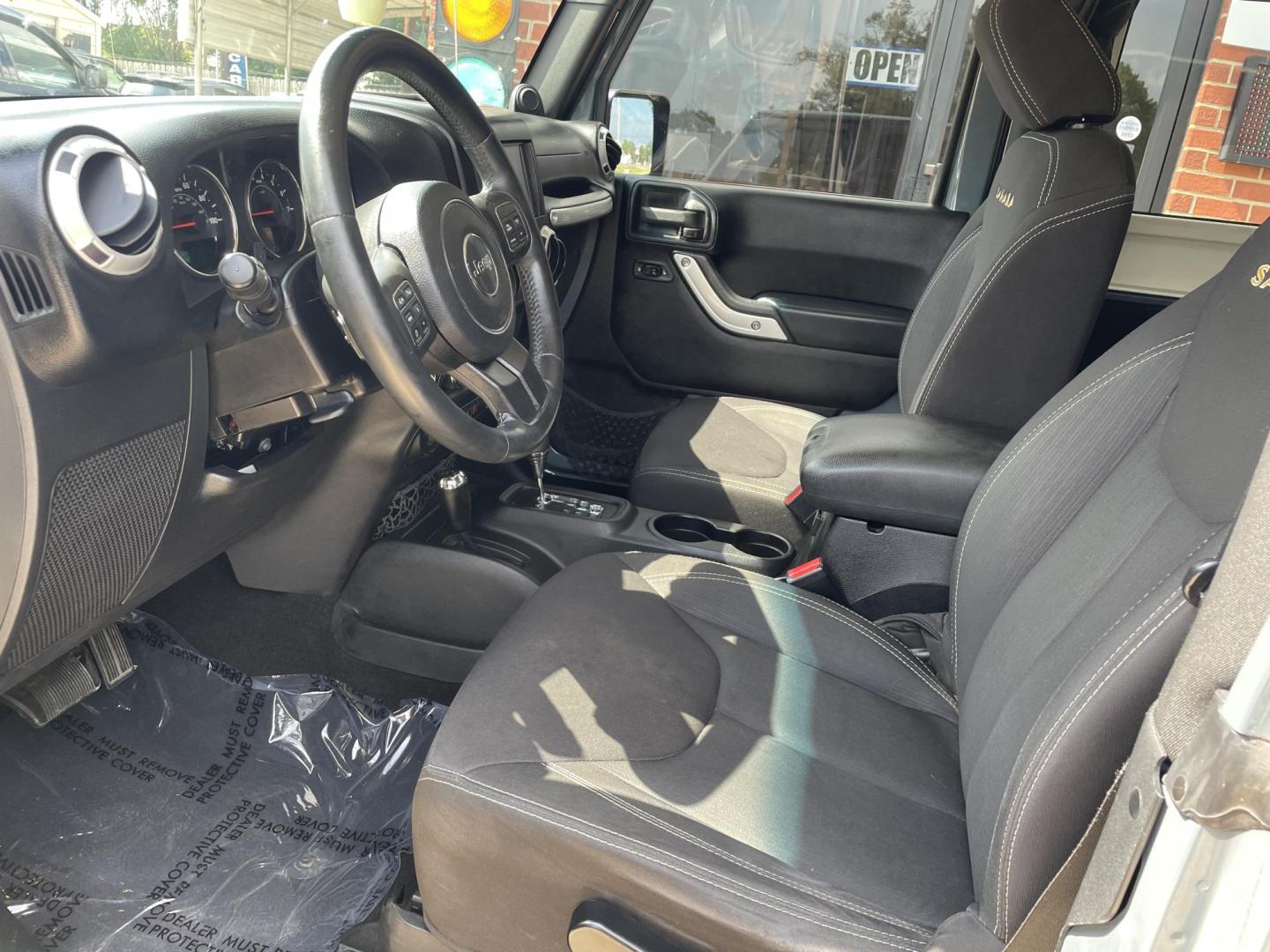2014 Gray /Black Jeep Wrangler Sahara 4WD (1C4AJWBG7EL) with an 3.6L V6 DOHC 24V FFV engine, Auto transmission, located at 204 Hwy. 16 East, Carthage, MS, 39051, (601) 267-7277, 0.000000, 0.000000 - Photo#4