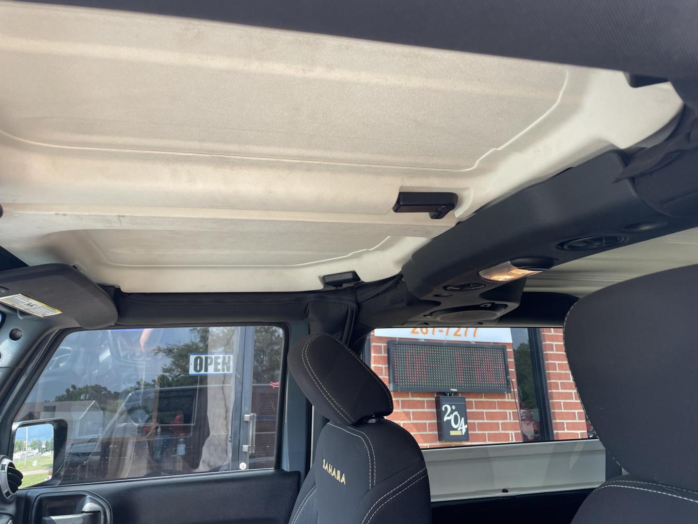 2014 Gray /Black Jeep Wrangler Sahara 4WD (1C4AJWBG7EL) with an 3.6L V6 DOHC 24V FFV engine, Auto transmission, located at 204 Hwy. 16 East, Carthage, MS, 39051, (601) 267-7277, 0.000000, 0.000000 - Photo#7