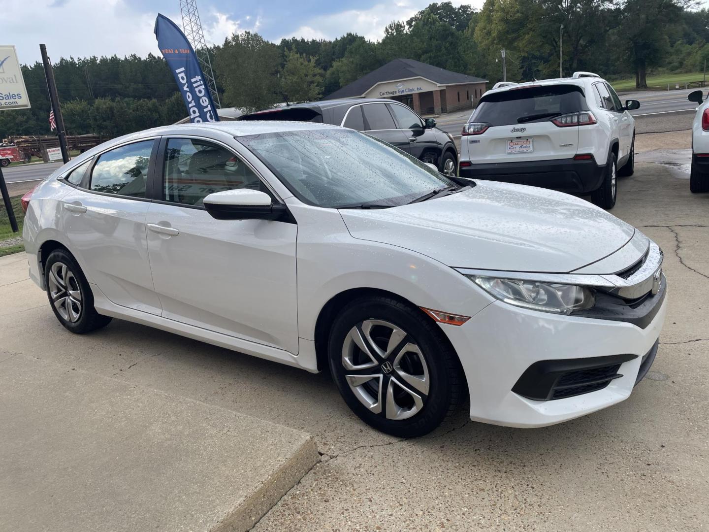 2018 White /Black Honda Civic LX Sedan CVT (2HGFC2F54JH) with an 2.0L L4 DOHC 16V engine, CVT transmission, located at 204 Hwy. 16 East, Carthage, MS, 39051, (601) 267-7277, 0.000000, 0.000000 - Photo#1