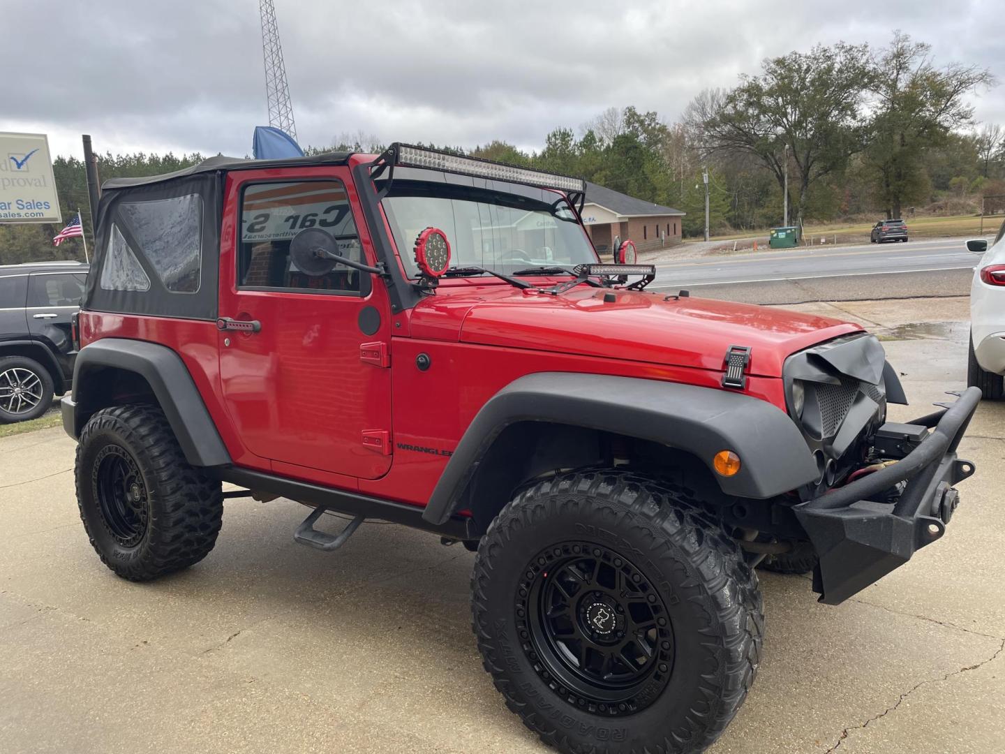 2015 Red /Black Jeep Wrangler Sport 4WD (1C4AJWAG8FL) with an 3.6L V6 DOHC 24V FFV engine, Auto transmission, located at 204 Hwy. 16 East, Carthage, MS, 39051, (601) 267-7277, 0.000000, 0.000000 - Photo#1