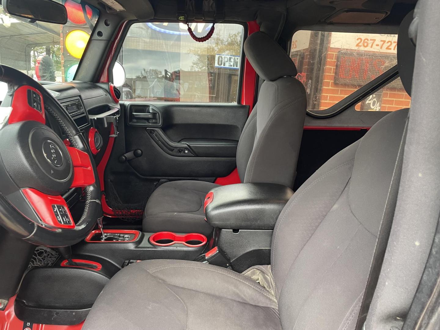 2015 Red /Black Jeep Wrangler Sport 4WD (1C4AJWAG8FL) with an 3.6L V6 DOHC 24V FFV engine, Auto transmission, located at 204 Hwy. 16 East, Carthage, MS, 39051, (601) 267-7277, 0.000000, 0.000000 - Photo#4