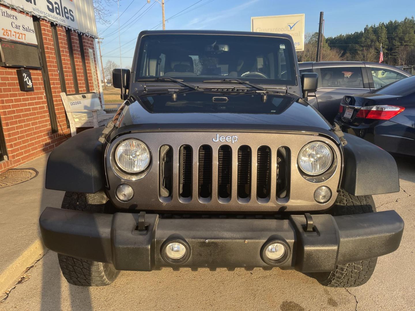 2018 Gray /Black Jeep Wrangler Unlimited Sport 4WD (1C4BJWDG9JL) with an 3.6L V6 DOHC 24V FFV engine, Auto transmission, located at 204 Hwy. 16 East, Carthage, MS, 39051, (601) 267-7277, 0.000000, 0.000000 - Photo#2