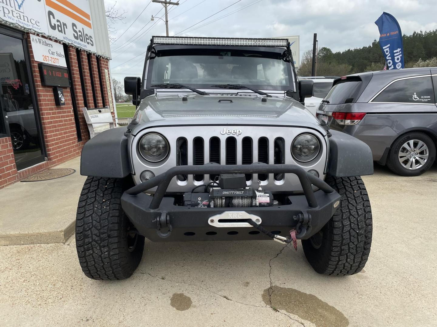 2016 Gray /Black Jeep Wrangler Unlimited Sport 4WD (1C4BJWDG4GL) with an 3.6L V6 DOHC 24V FFV engine, auto transmission, located at 204 Hwy. 16 East, Carthage, MS, 39051, (601) 267-7277, 0.000000, 0.000000 - Photo#2