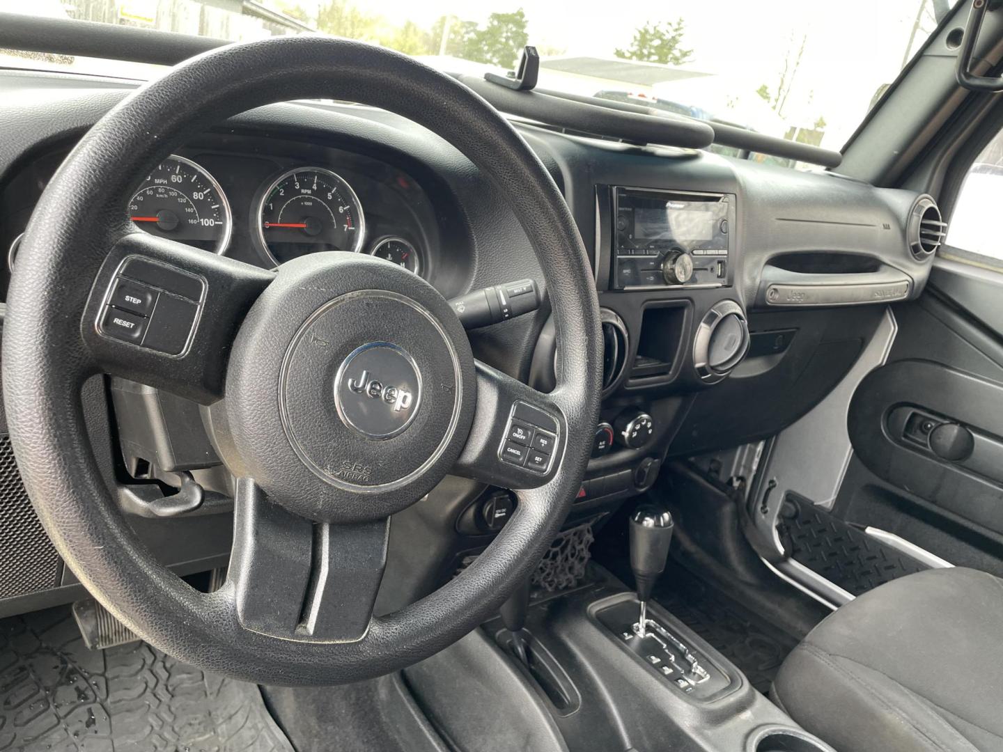 2016 Gray /Black Jeep Wrangler Unlimited Sport 4WD (1C4BJWDG4GL) with an 3.6L V6 DOHC 24V FFV engine, auto transmission, located at 204 Hwy. 16 East, Carthage, MS, 39051, (601) 267-7277, 0.000000, 0.000000 - Photo#4