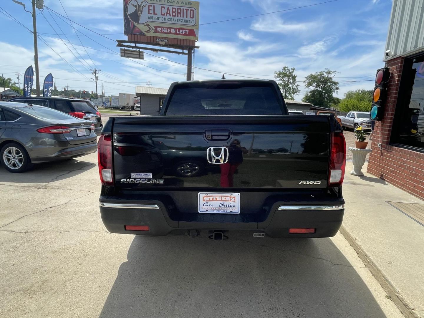 2019 Black /Gray Honda Ridgeline Sport AWD (5FPYK3F1XKB) with an 3.5L V6 SOHC 24V engine, 6A transmission, located at 204 Hwy. 16 East, Carthage, MS, 39051, (601) 267-7277, 0.000000, 0.000000 - Photo#3