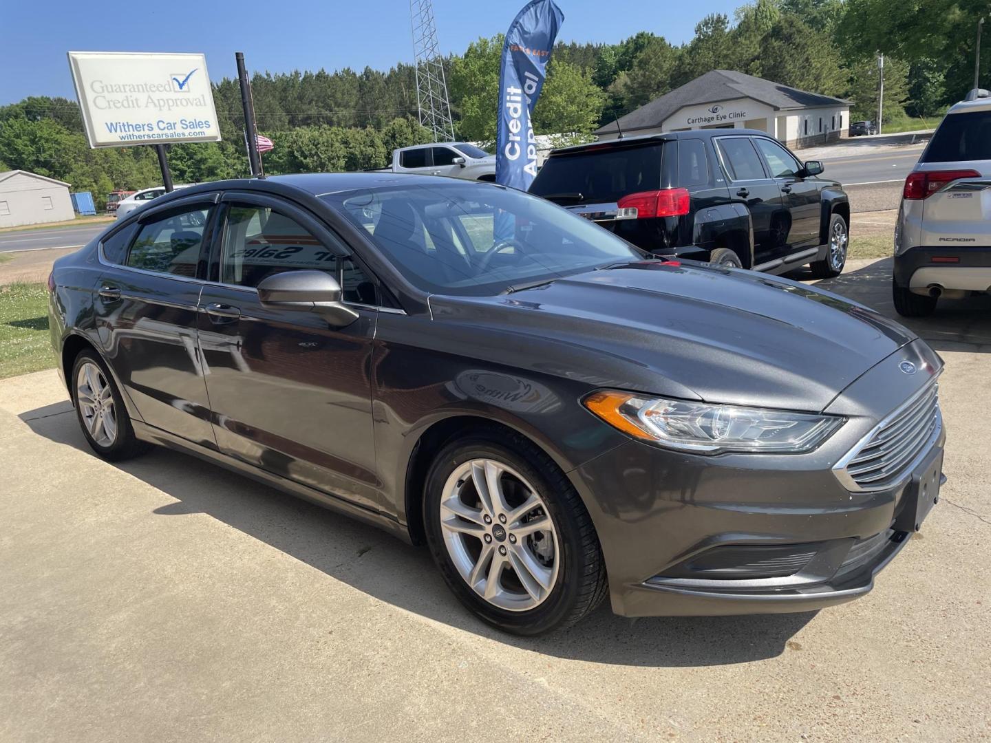 2018 Gray /Gray Ford Fusion SE (3FA6P0H76JR) with an 2.5L L4 DOHC 16V engine, 6A transmission, located at 204 Hwy. 16 East, Carthage, MS, 39051, (601) 267-7277, 0.000000, 0.000000 - Photo#1
