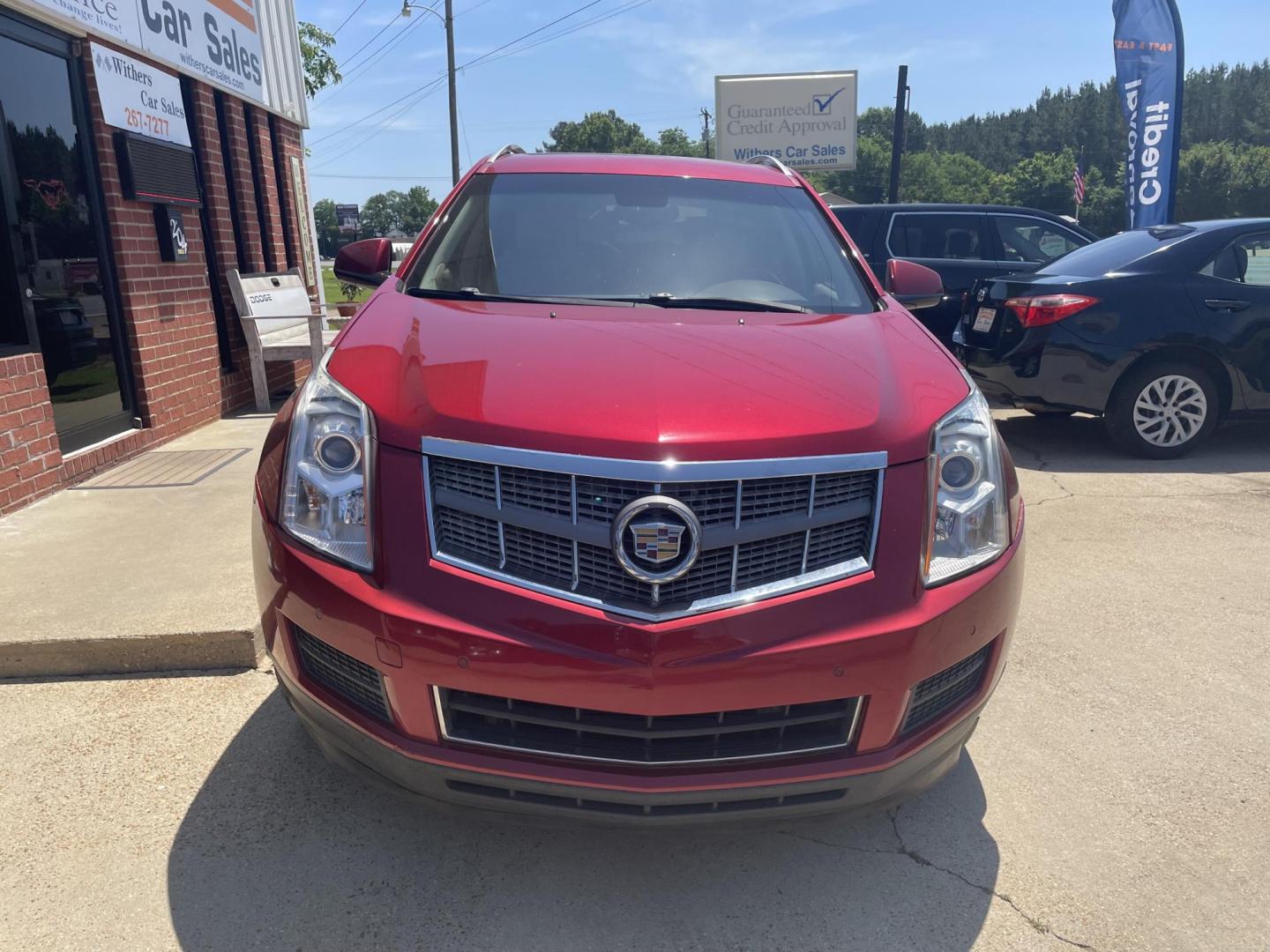 2011 BURGUNDY /BEIGE Cadillac SRX Luxury Collection (3GYFNAEY3BS) with an 3.0L V6 DOHC 24V engine, 6-Speed Automatic transmission, located at 204 Hwy. 16 East, Carthage, MS, 39051, (601) 267-7277, 0.000000, 0.000000 - Photo#2