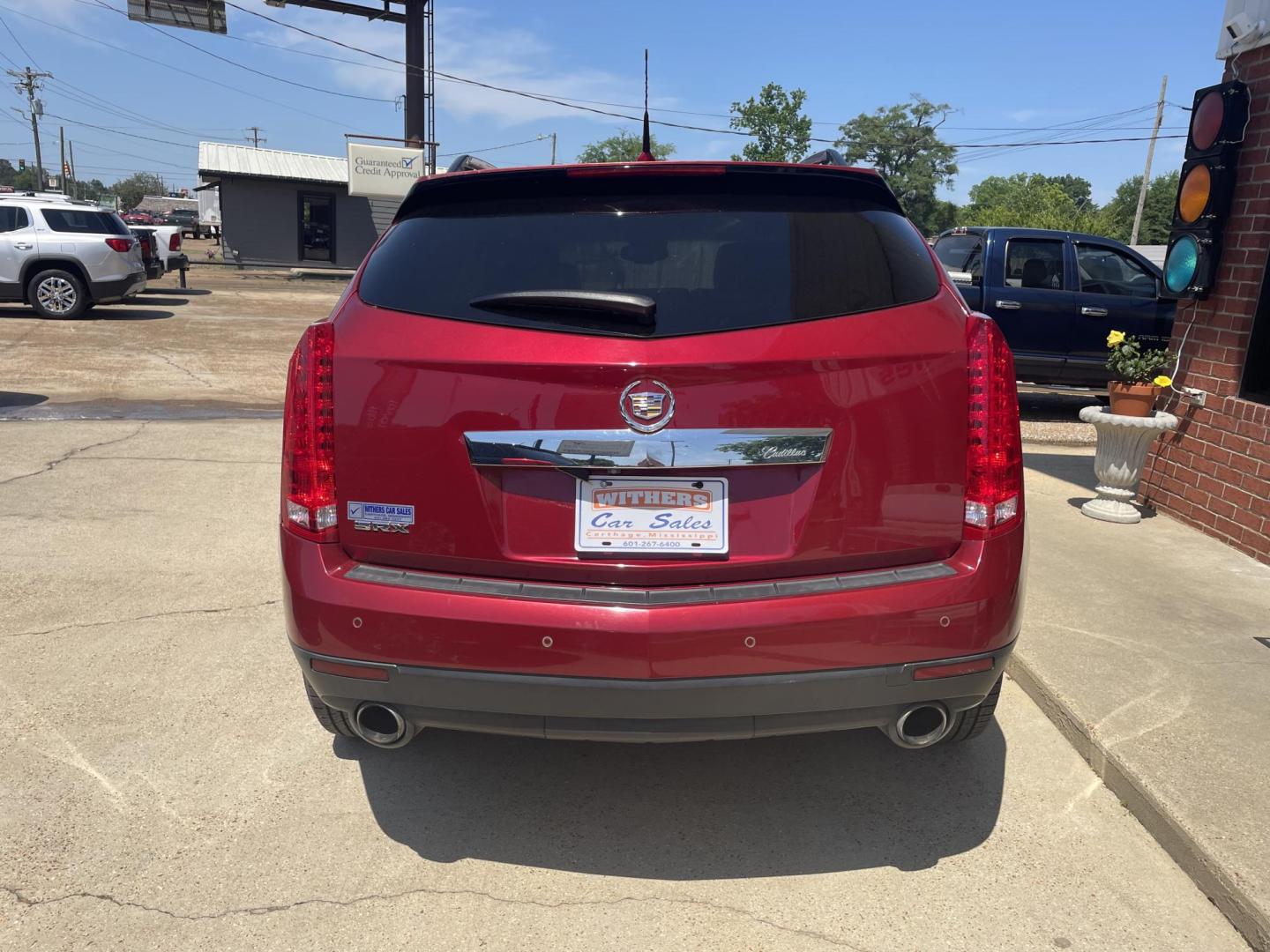 2011 BURGUNDY /BEIGE Cadillac SRX Luxury Collection (3GYFNAEY3BS) with an 3.0L V6 DOHC 24V engine, 6-Speed Automatic transmission, located at 204 Hwy. 16 East, Carthage, MS, 39051, (601) 267-7277, 0.000000, 0.000000 - Photo#3