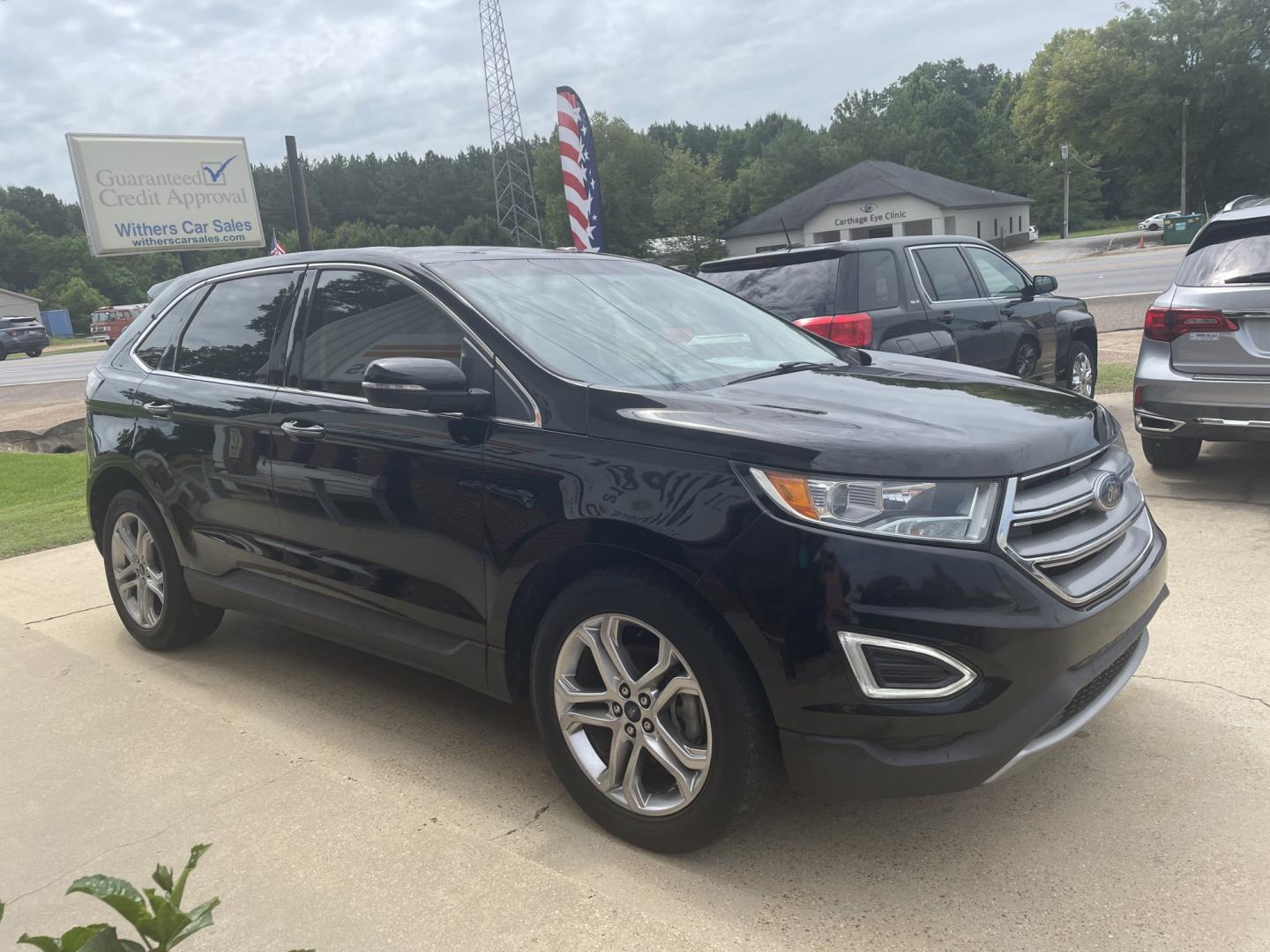 2017 Black /Gray Ford Edge Titanium (2FMPK3K91HB) with an 2.0L L4 DOHC 16V engine, 6A transmission, located at 204 Hwy. 16 East, Carthage, MS, 39051, (601) 267-7277, 0.000000, 0.000000- Photo#1