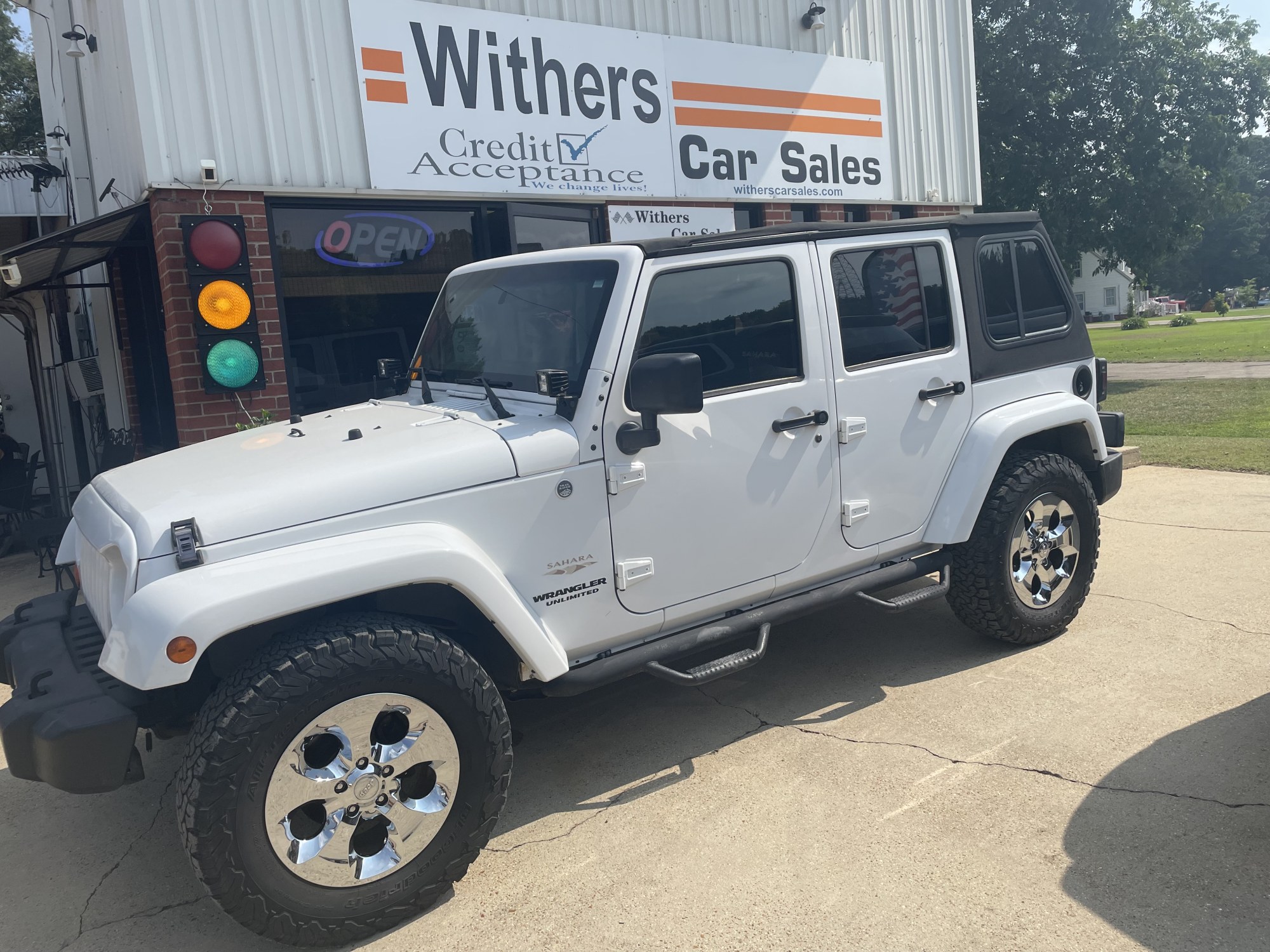 photo of 2013 Jeep Wrangler Unlimited Sahara 4WD