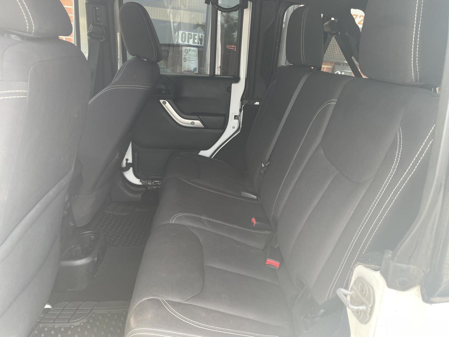 2013 White /Black Jeep Wrangler Unlimited Sahara 4WD (1C4BJWEG4DL) with an 3.6L V6 DOHC 24V FFV engine, AUTO transmission, located at 204 Hwy. 16 East, Carthage, MS, 39051, (601) 267-7277, 0.000000, 0.000000- Photo#6