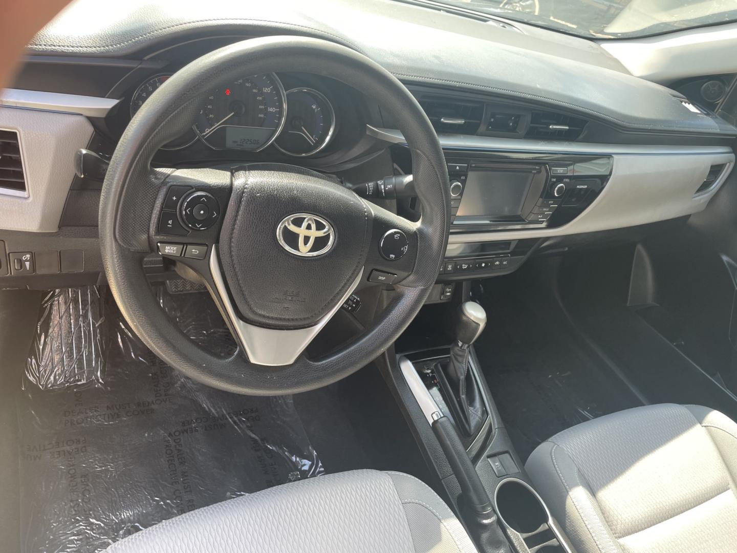 2015 Black /Gray Toyota Corolla (5YFBURHE4FP) with an 1.8L L4 DOHC 16V engine, 4-Speed Automatic transmission, located at 204 Hwy. 16 East, Carthage, MS, 39051, (601) 267-7277, 0.000000, 0.000000- Photo#5
