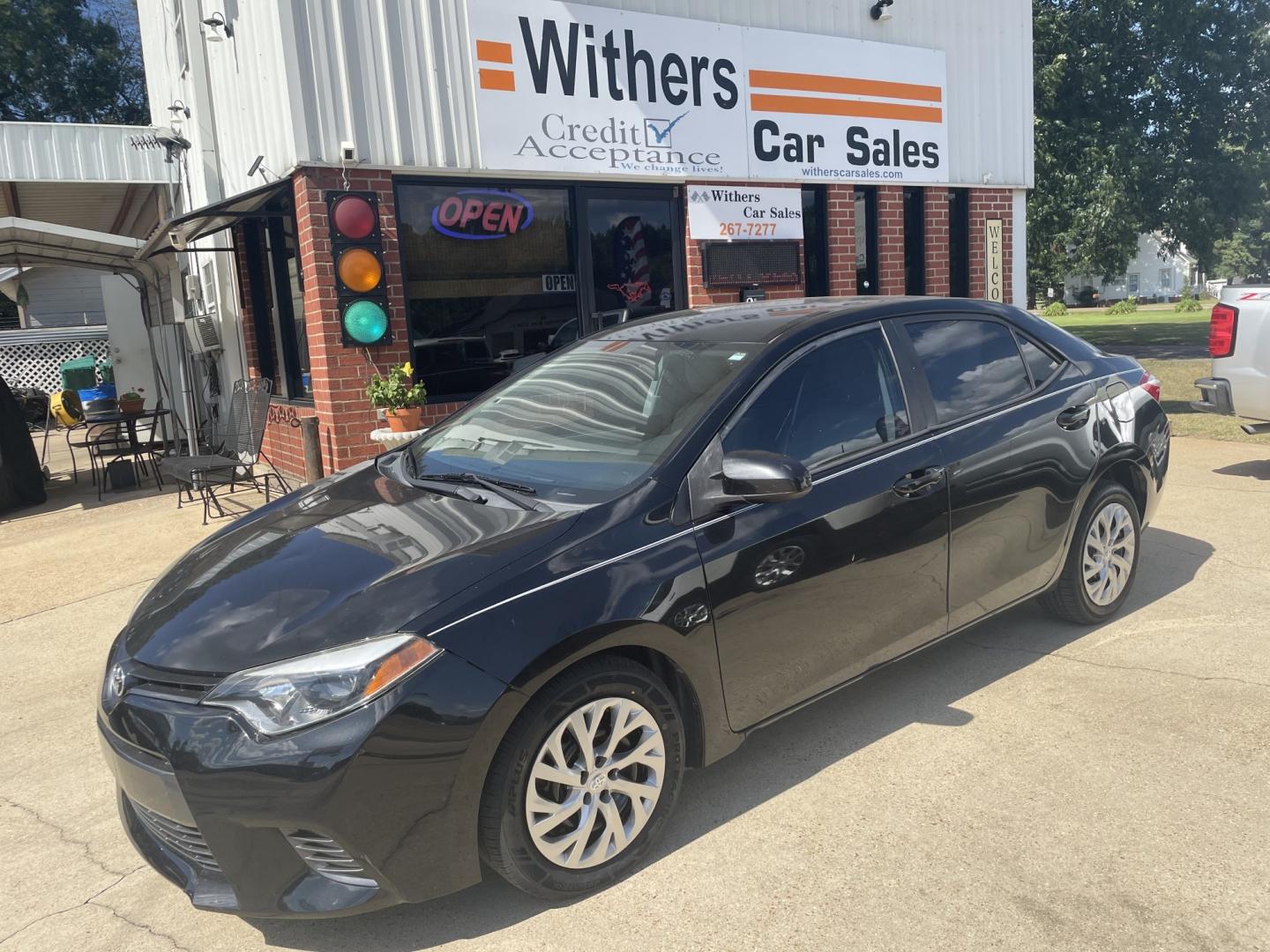 2015 Black /Gray Toyota Corolla (5YFBURHE4FP) with an 1.8L L4 DOHC 16V engine, 4-Speed Automatic transmission, located at 204 Hwy. 16 East, Carthage, MS, 39051, (601) 267-7277, 0.000000, 0.000000- Photo#0