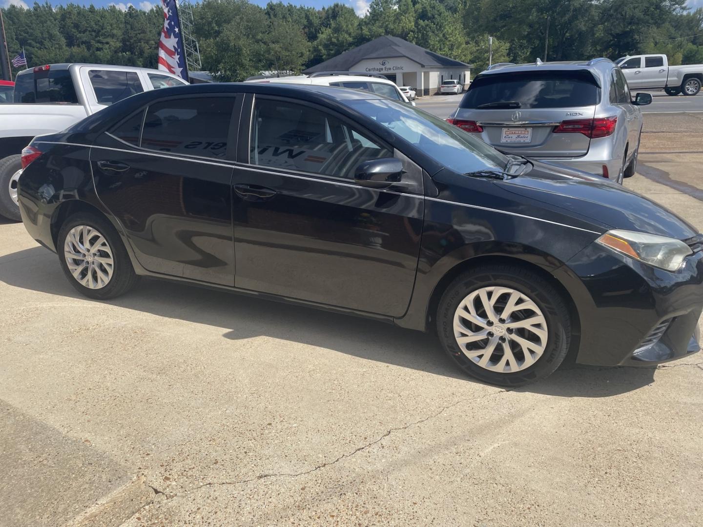 2015 Black /Gray Toyota Corolla (5YFBURHE4FP) with an 1.8L L4 DOHC 16V engine, 4-Speed Automatic transmission, located at 204 Hwy. 16 East, Carthage, MS, 39051, (601) 267-7277, 0.000000, 0.000000- Photo#1