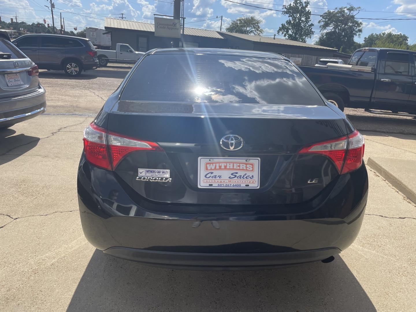 2015 Black /Gray Toyota Corolla (5YFBURHE4FP) with an 1.8L L4 DOHC 16V engine, 4-Speed Automatic transmission, located at 204 Hwy. 16 East, Carthage, MS, 39051, (601) 267-7277, 0.000000, 0.000000- Photo#3