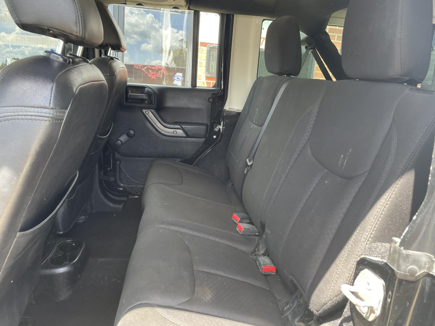 2014 Black /Black Jeep Wrangler Unlimited Sport 4WD (1C4BJWDGXEL) with an 3.6L V6 DOHC 24V FFV engine, A transmission, located at 204 Hwy. 16 East, Carthage, MS, 39051, (601) 267-7277, 0.000000, 0.000000- Photo#6