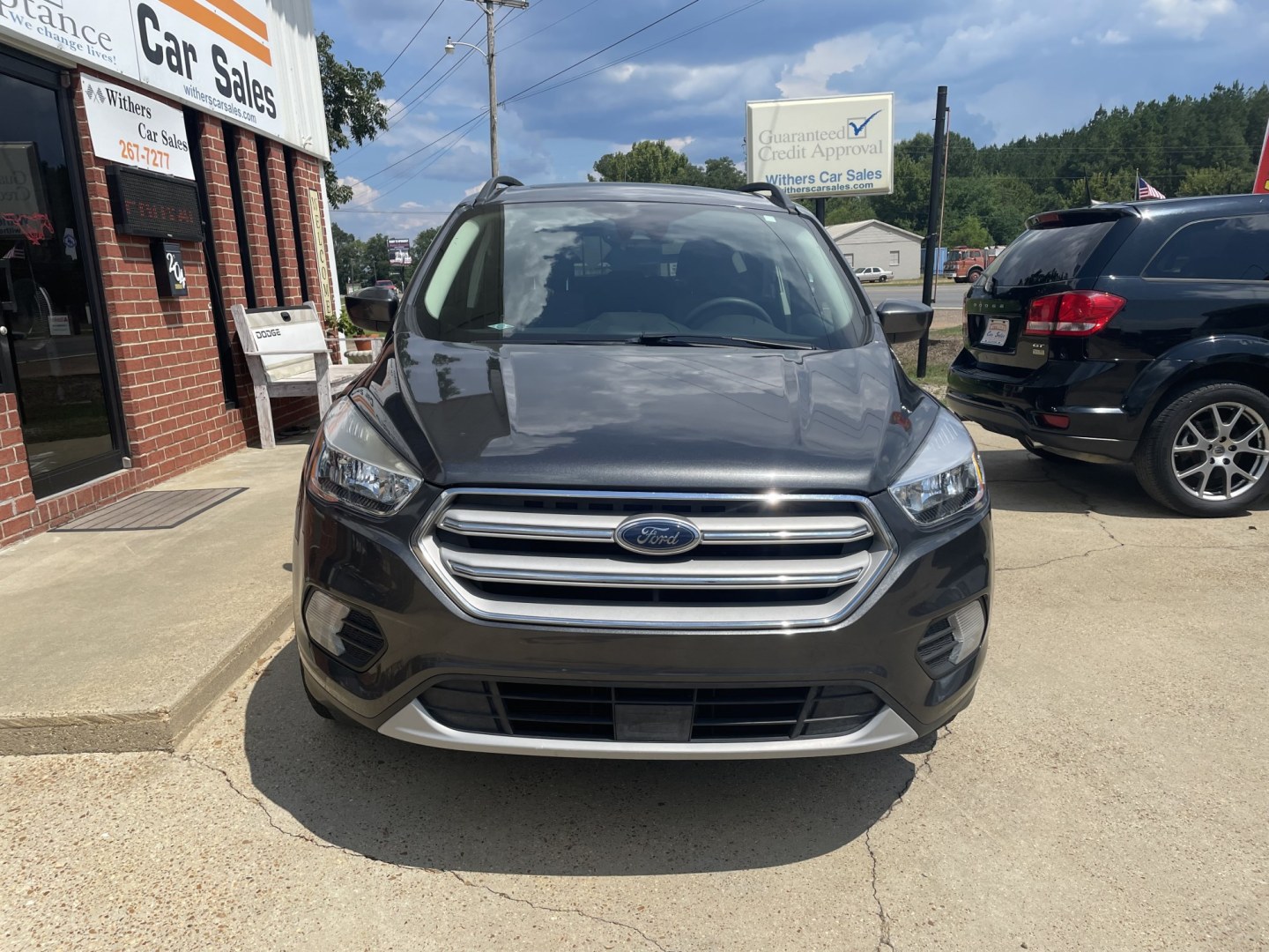 2018 Gray /Gray Ford Escape SE FWD (1FMCU0GD9JU) with an 1.5L L4 DOHC 16V engine, 6A transmission, located at 204 Hwy. 16 East, Carthage, MS, 39051, (601) 267-7277, 0.000000, 0.000000- Photo#2