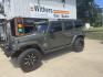 2015 Green /Black/Tan Jeep Wrangler Unlimited Sahara 4WD (1C4BJWEG4FL) with an 3.6L V6 DOHC 24V FFV engine, A transmission, located at 204 Hwy. 16 East, Carthage, MS, 39051, (601) 267-7277, 0.000000, 0.000000- Photo#0