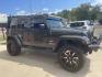 2015 Green /Black/Tan Jeep Wrangler Unlimited Sahara 4WD (1C4BJWEG4FL) with an 3.6L V6 DOHC 24V FFV engine, A transmission, located at 204 Hwy. 16 East, Carthage, MS, 39051, (601) 267-7277, 0.000000, 0.000000- Photo#1