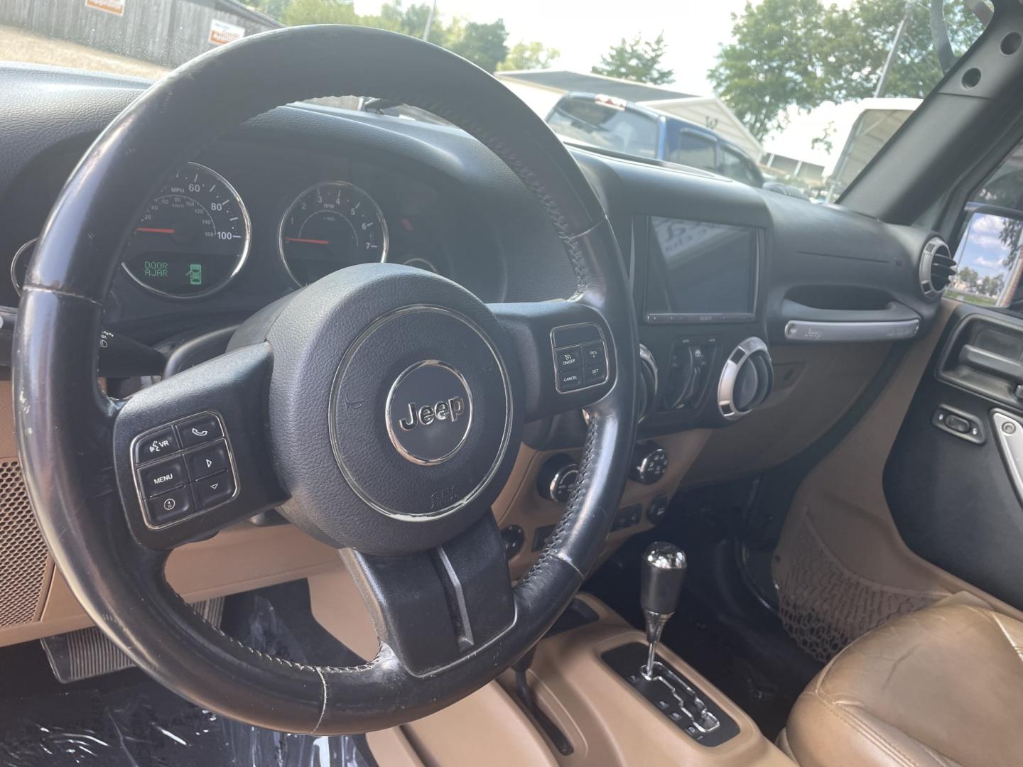 2015 Green /Black/Tan Jeep Wrangler Unlimited Sahara 4WD (1C4BJWEG4FL) with an 3.6L V6 DOHC 24V FFV engine, A transmission, located at 204 Hwy. 16 East, Carthage, MS, 39051, (601) 267-7277, 0.000000, 0.000000- Photo#5