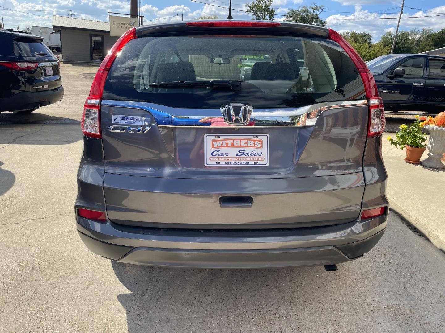 2016 Gray /Gray Honda CR-V LX 2WD (3CZRM3H3XGG) with an 2.4L L4 DOHC 16V engine, CVT transmission, located at 204 Hwy. 16 East, Carthage, MS, 39051, (601) 267-7277, 0.000000, 0.000000- Photo#3